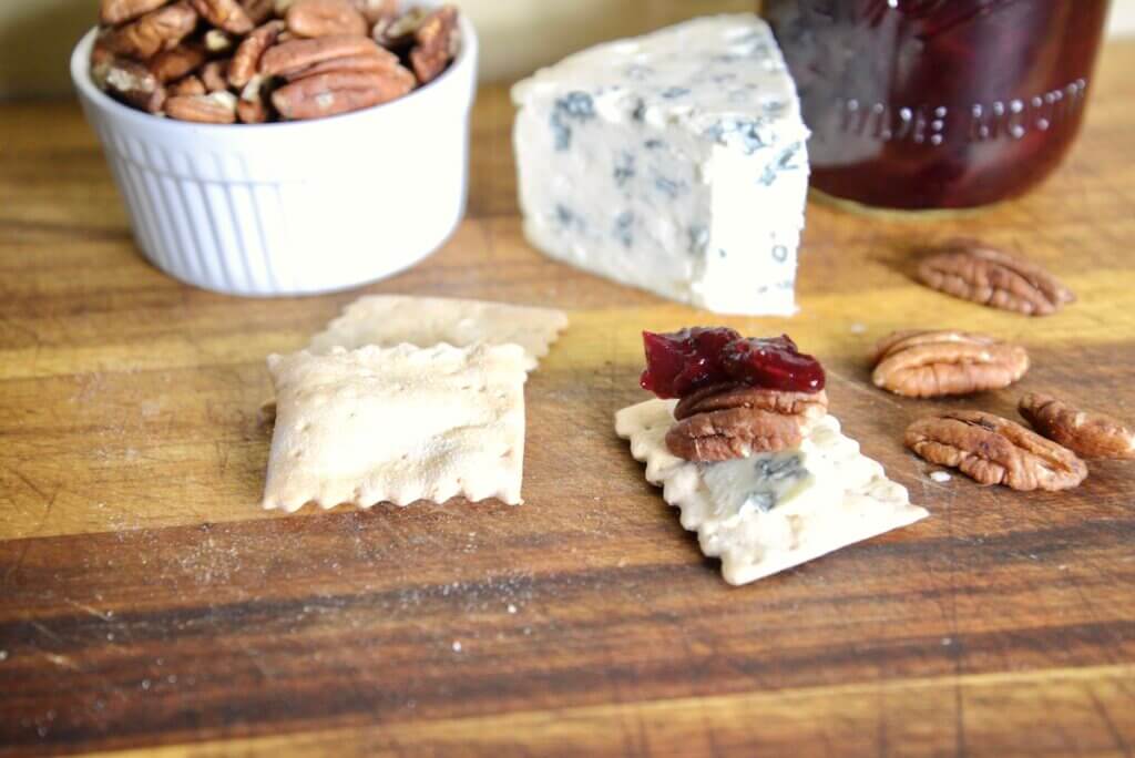 roasted nuts, cheese, and crackers