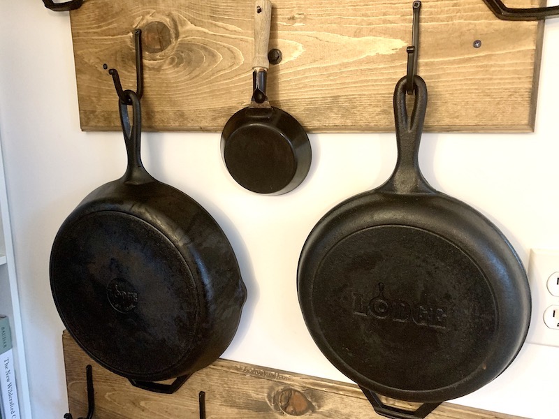 Neat idea for cast iron storage.  Cast iron decor, Cast iron cookware  display, Cleaning cast iron pans