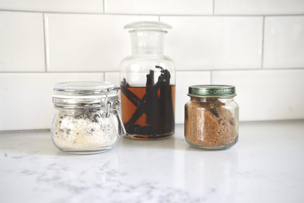 homemade vanilla extract and sugar in jars