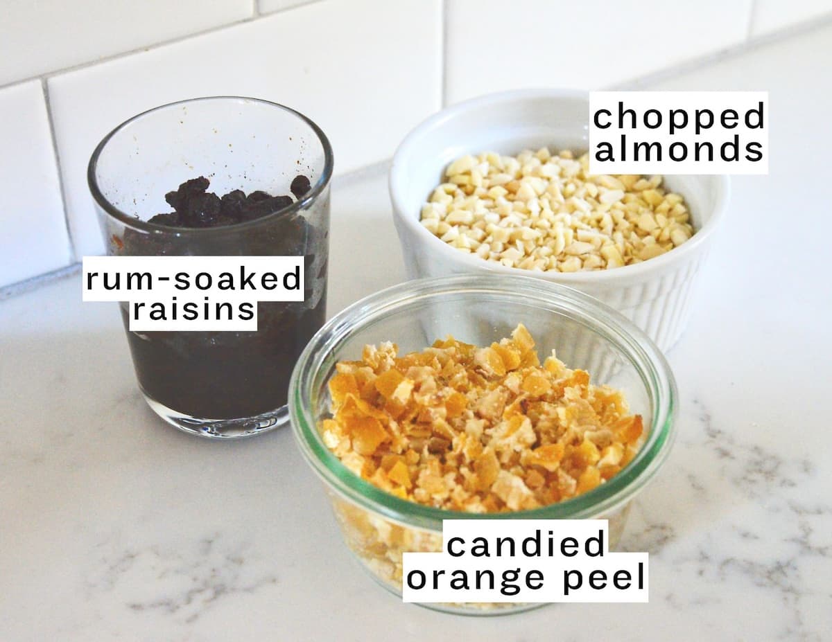 Stollen ingredients: rum-soaked raisins, chopped almonds, candied orange peel