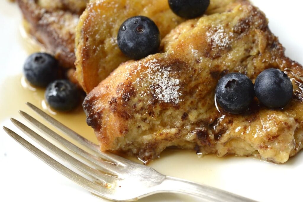 slices of panettone French toast on plate