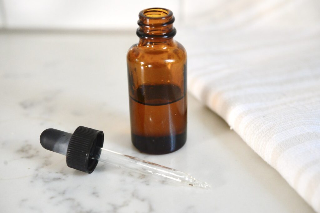 anti-aging face serum in dropper bottle
