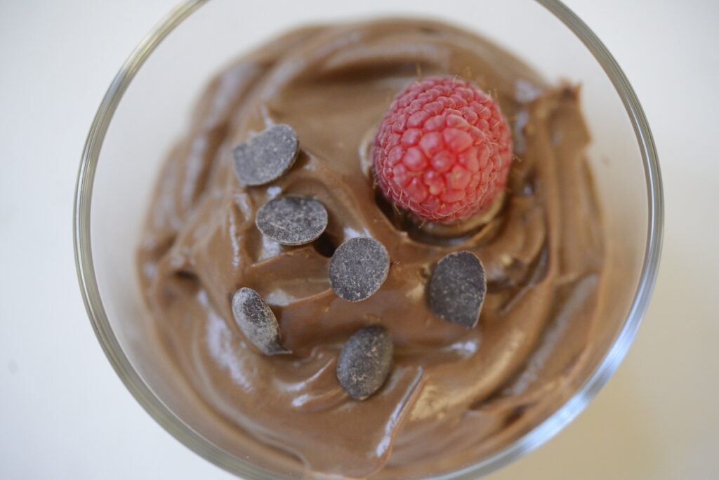 chocolate avocado pudding with raspberry and mint