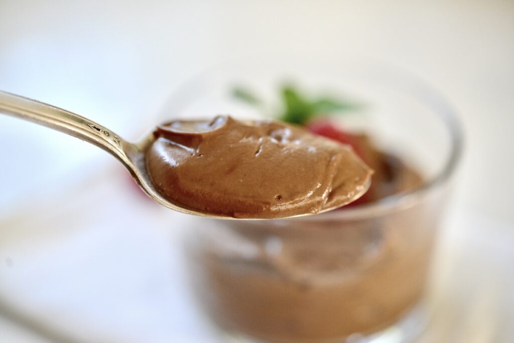 spoon with chocolate dessert