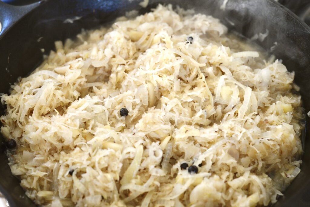 braised sauerkraut in cast iron skillet