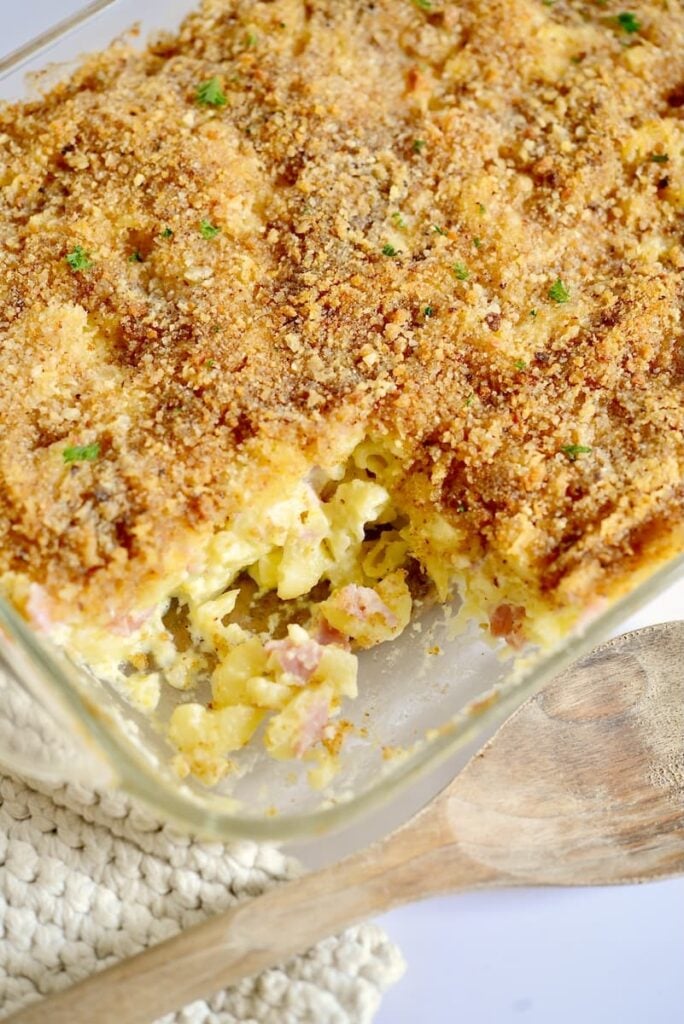 German Schinkennudeln with crispy cheese topping in casserole dish