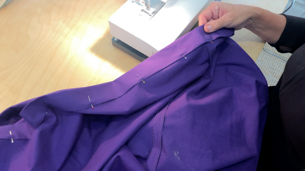 sewing the bottom hem of the skirt