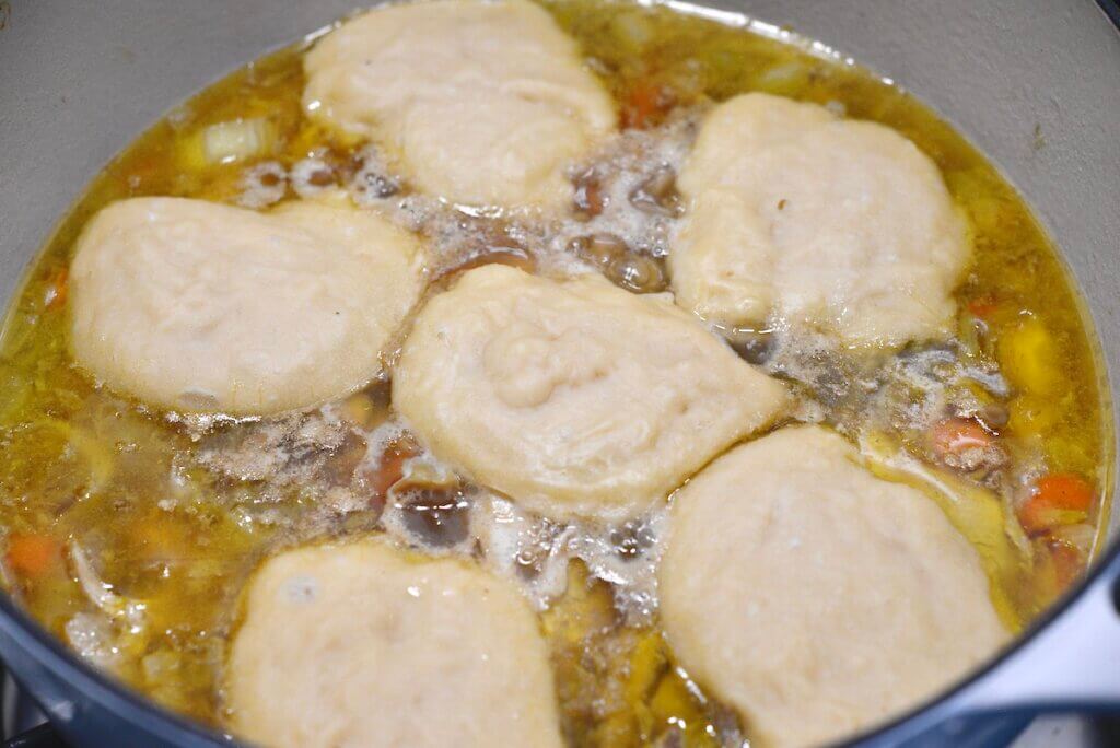 chicken and sourdough dumplings in large pot