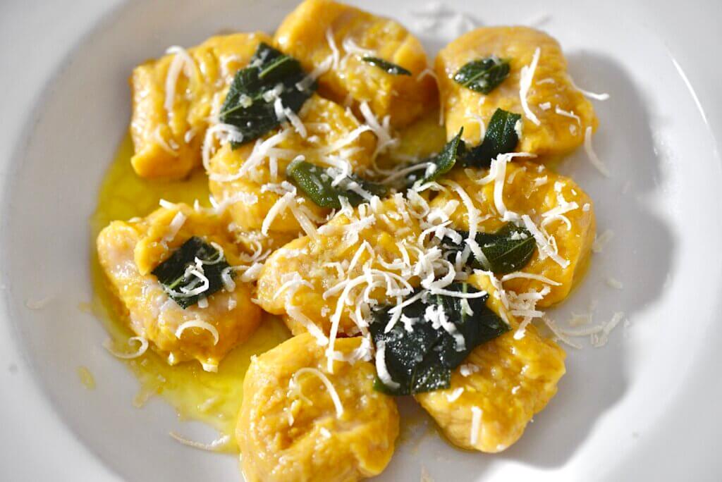 pumpkin gnocchi with sage brown butter sauce and freshly grated parmesan