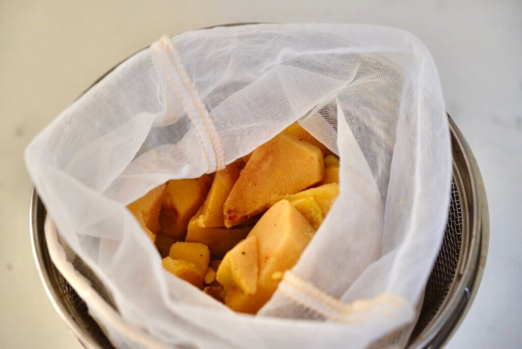 quince pieces draining