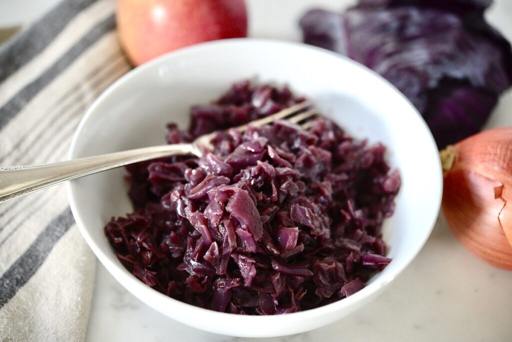 German red cabbage in bowl with fork