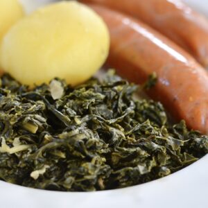 braised kale with potatoes with sausages