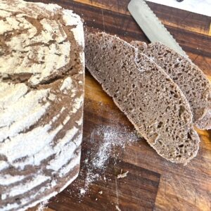 slices of sourdough rye bread on cutting board