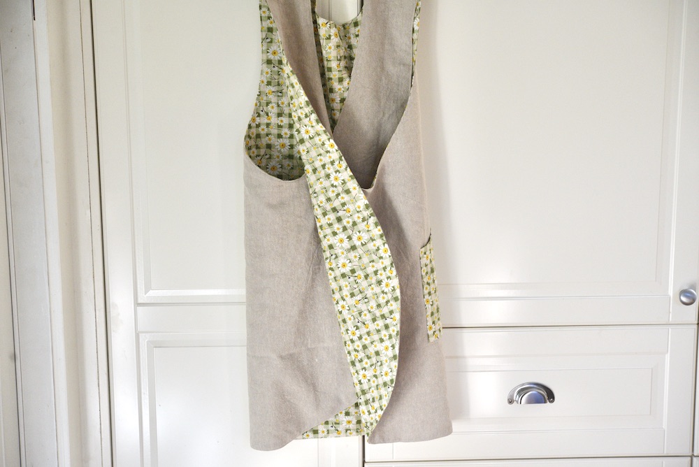 reversible apron hanging in kitchen