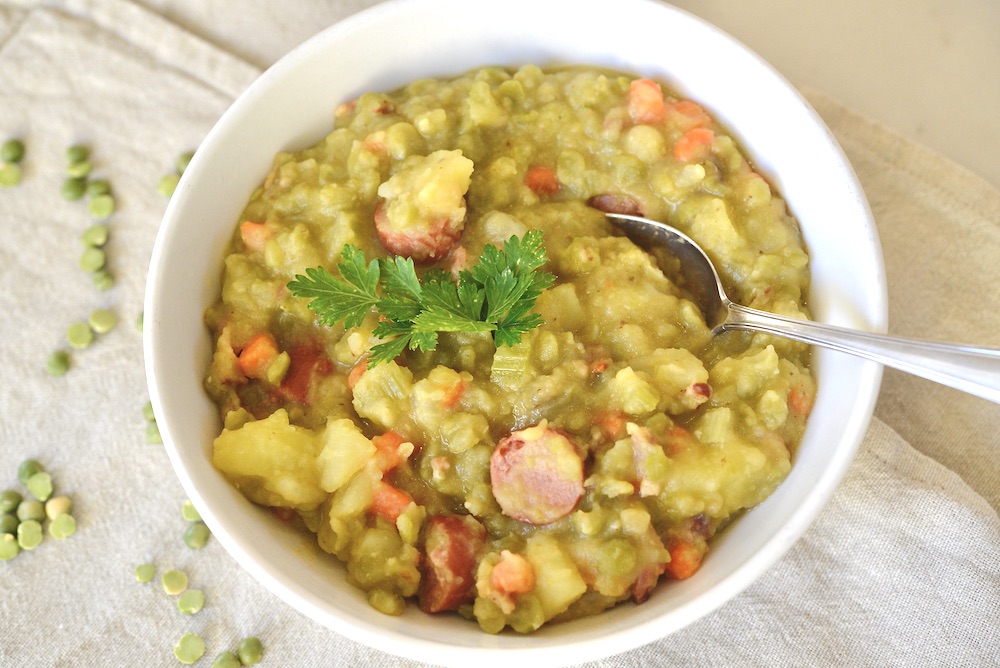 bowl of german pea soup with spoon