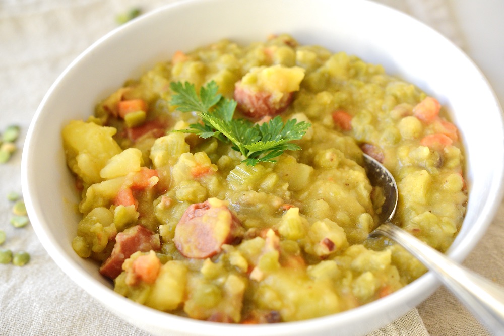 bowl with German split pea soup and spoon