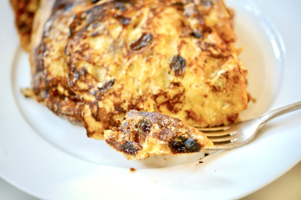 slices of French toast on plate with fork