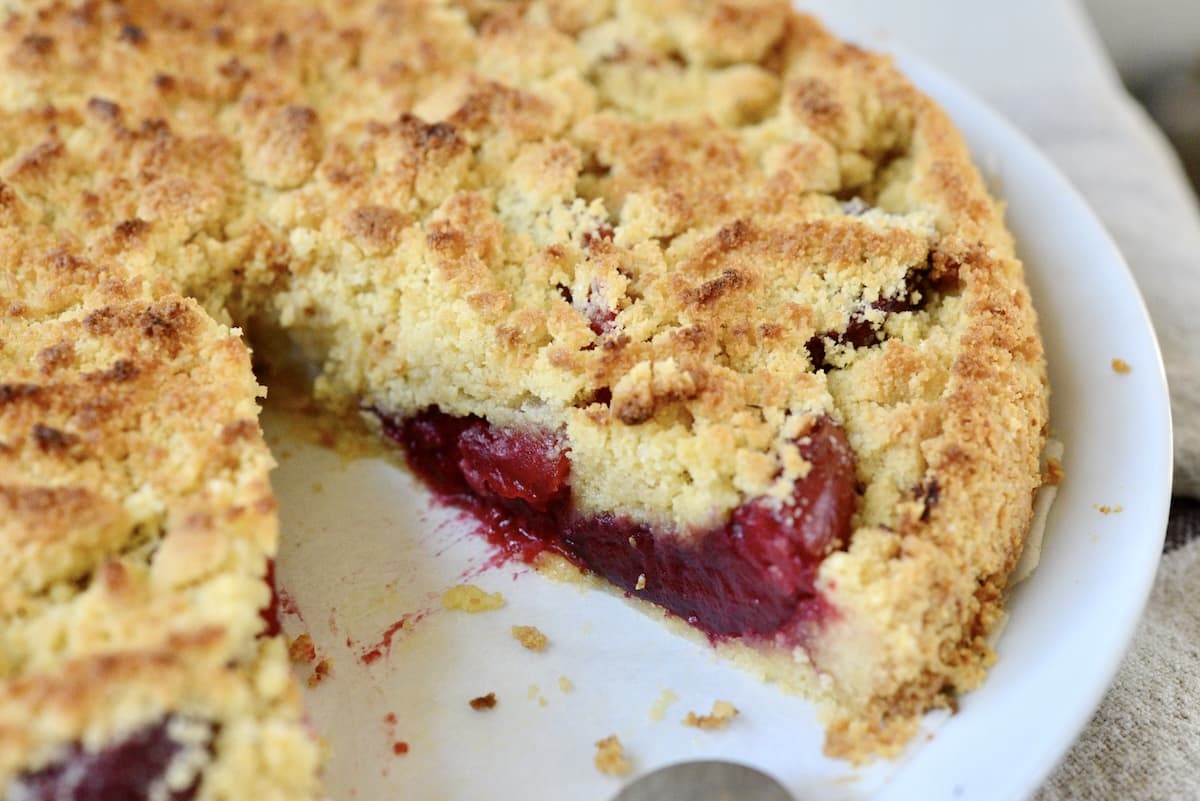 inside of streuselkuchen with one piece removed