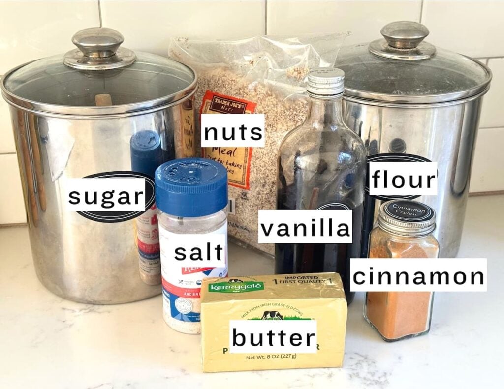 streuselkuchen ingredients: flour, sugar, nuts, salt, vanilla, cinnamon powder, and butter