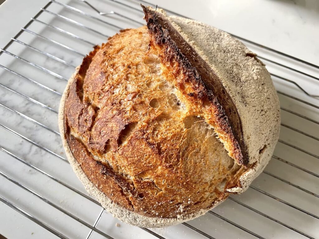 sourdough bread on wire rack