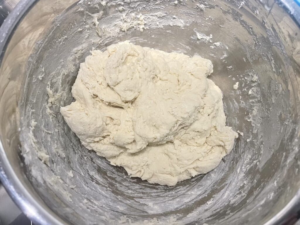 sourdough English muffin dough in mixing bowl