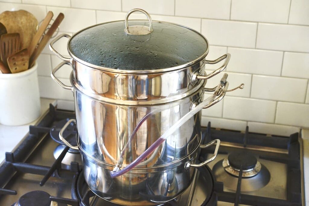 Norpro steam juicer on stove