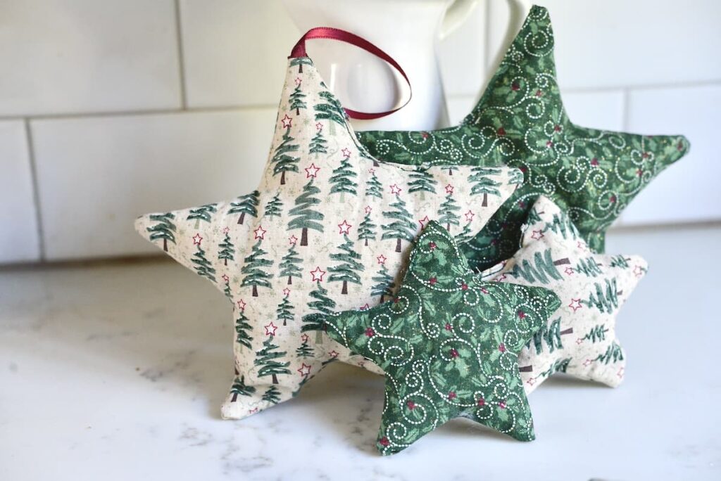 4 fabric star ornaments on kitchen counter