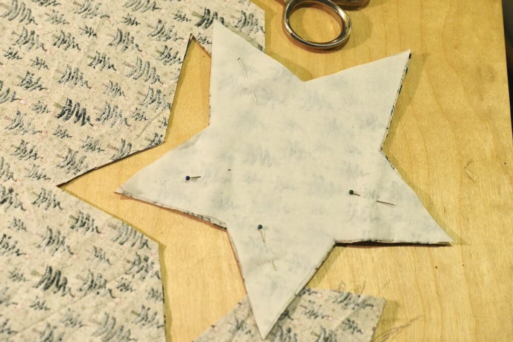 star pattern pinned to fabric