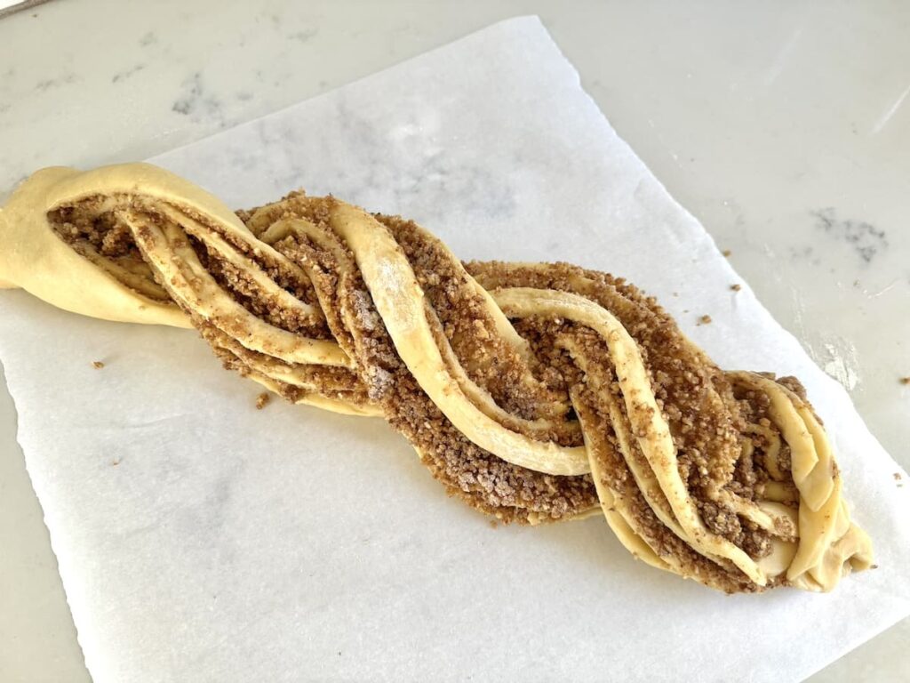 German sweet bread twisted up before baking