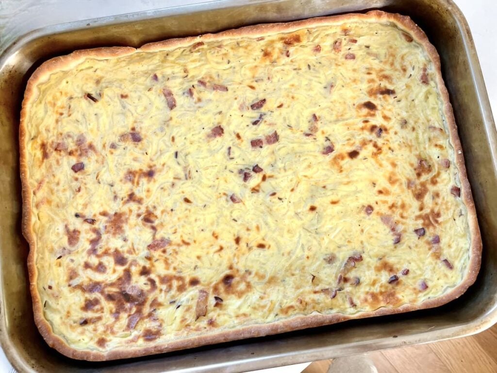 large baking dish with an entire German onion pie (Zwiebelkuchen)