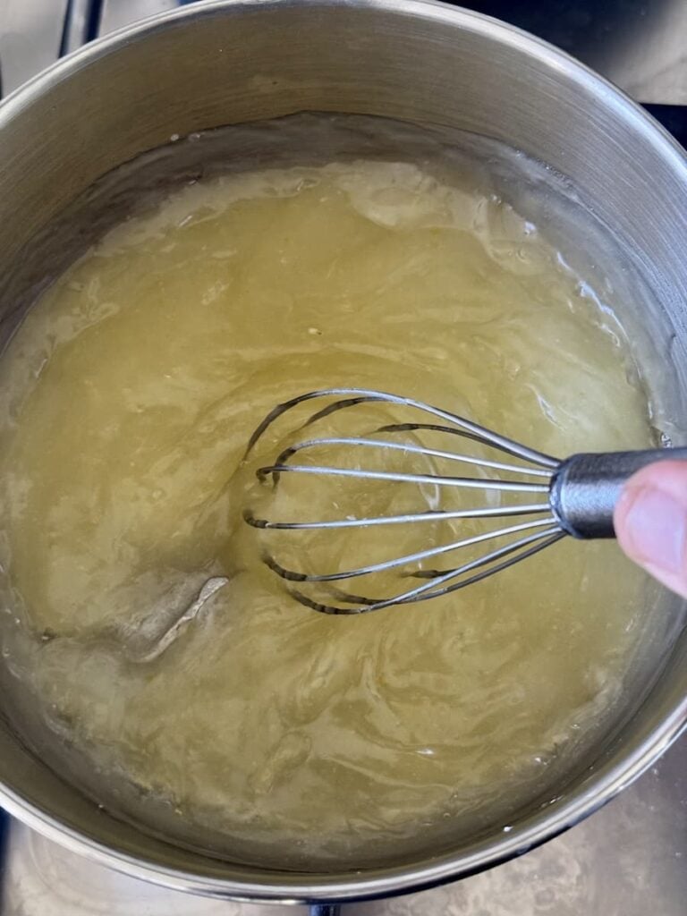wire whisk whisking lemon cornstarch mixture