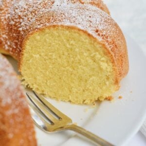 round egg liqueur cake cut open on plate
