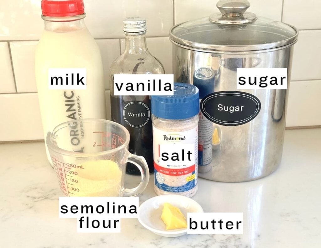 semolina pudding ingredients: milk, vanilla extract, sugar, semolina flour, salt, and butter