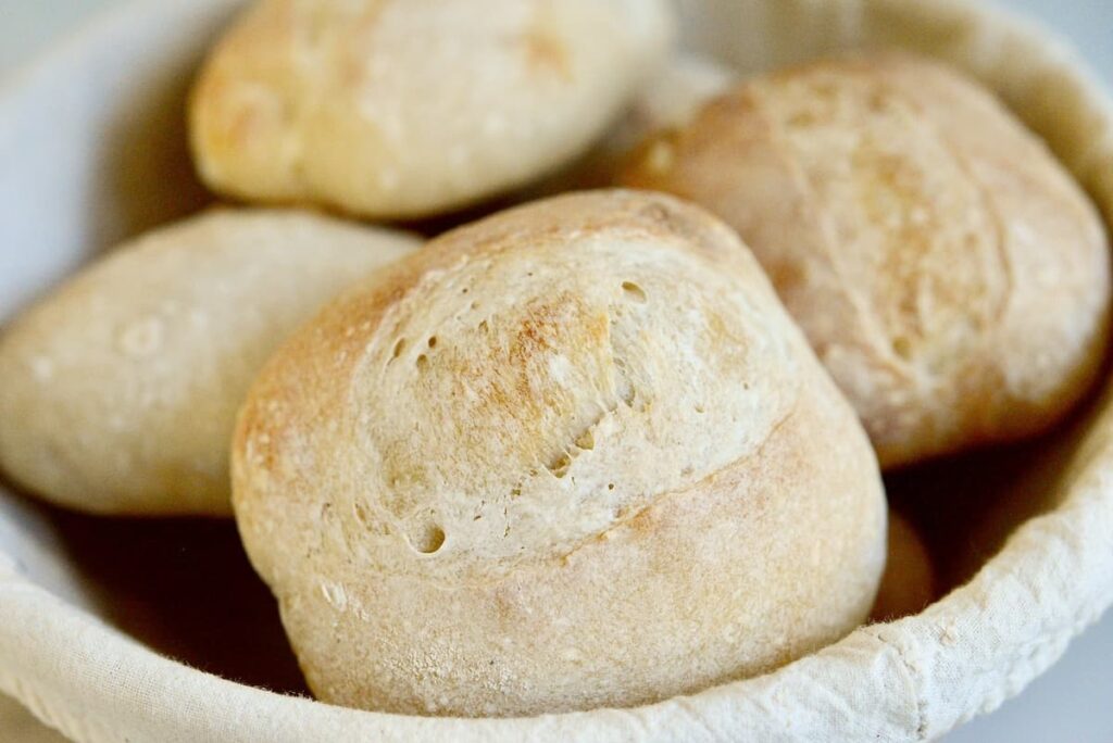 bread basket with dinner rolls