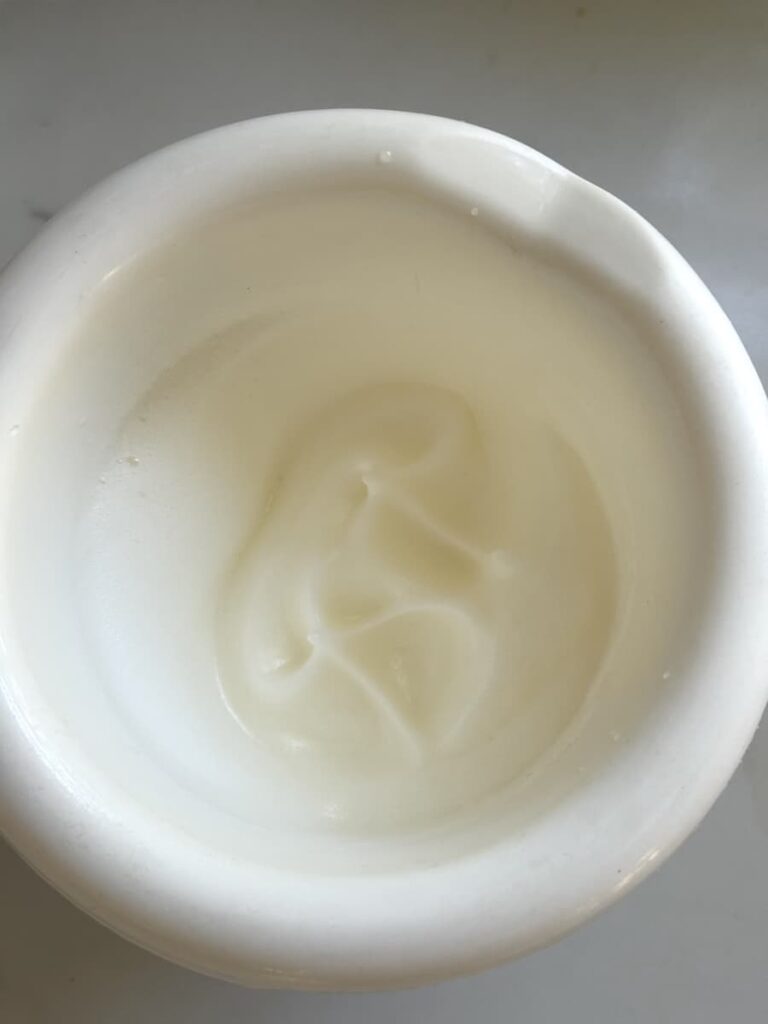 whipped egg whites in white bowl