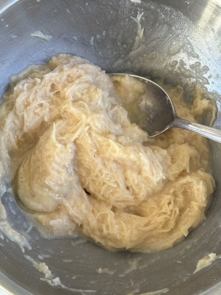 potato mixture in bowl with spoon