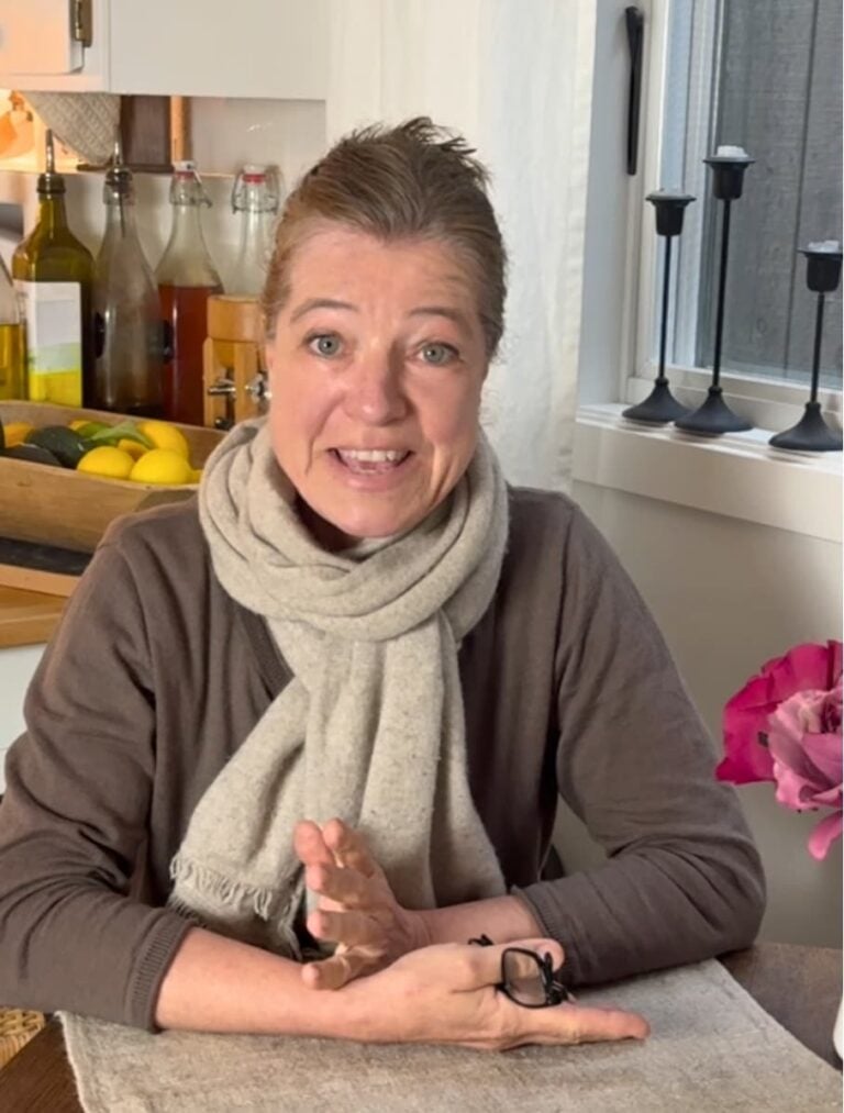 Anja sitting at The Heritage Kitchen Table - Membership.