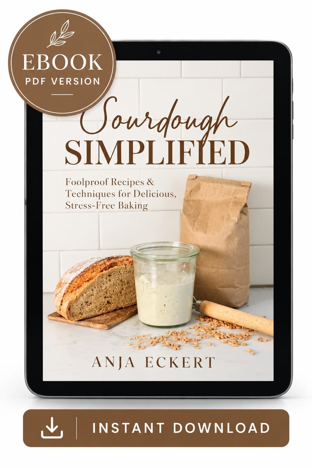 A tablet displaying the Sourdough Simplified PDF Ebook cover, which features a loaf of bread, a glass jar of starter, and a paper bag of grain.
